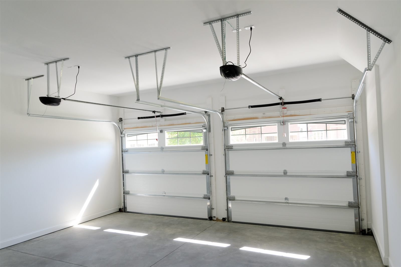 New smooth concrete garage floor slab in an Omaha, NE two-car garage